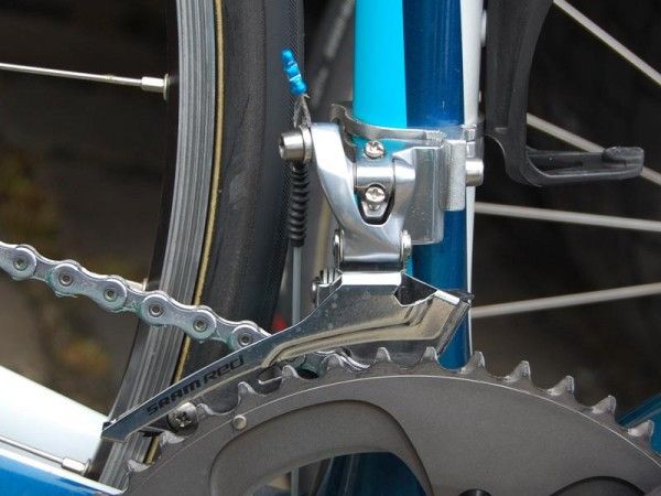 A steel cage on a SRAM Red front derailleur body adds rigidity as compared to the stock titanium unit.