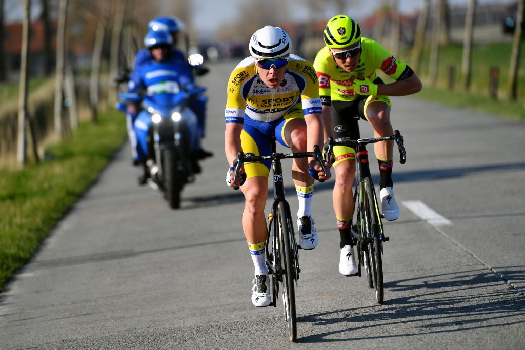 DE PANNE BELGIUM MARCH 23 LR Jens Reynders of Belgium and Team Sport Vlaanderen Baloise and Dimitri Peyskens of Belgium and Team Bingoal Pauwels Sauces WB compete in the breakaway during the 46th Minerva Classic Brugge De Panne 2022 a 2079km stage from Brugge to De Panne MinervaClassic on March 23 2022 in De Panne Belgium Photo by Luc ClaessenGetty Images