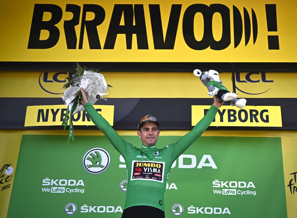 JumboVisma teams Belgian rider Wout Van Aert celebrates with the sprinters green jersey on the podium after the 2nd stage of the 109th edition of the Tour de France cycling race 2022 km between Roskilde and Nyborg in Denmark on July 2 2022 Photo by AnneChristine POUJOULAT AFP Photo by ANNECHRISTINE POUJOULATAFP via Getty Images