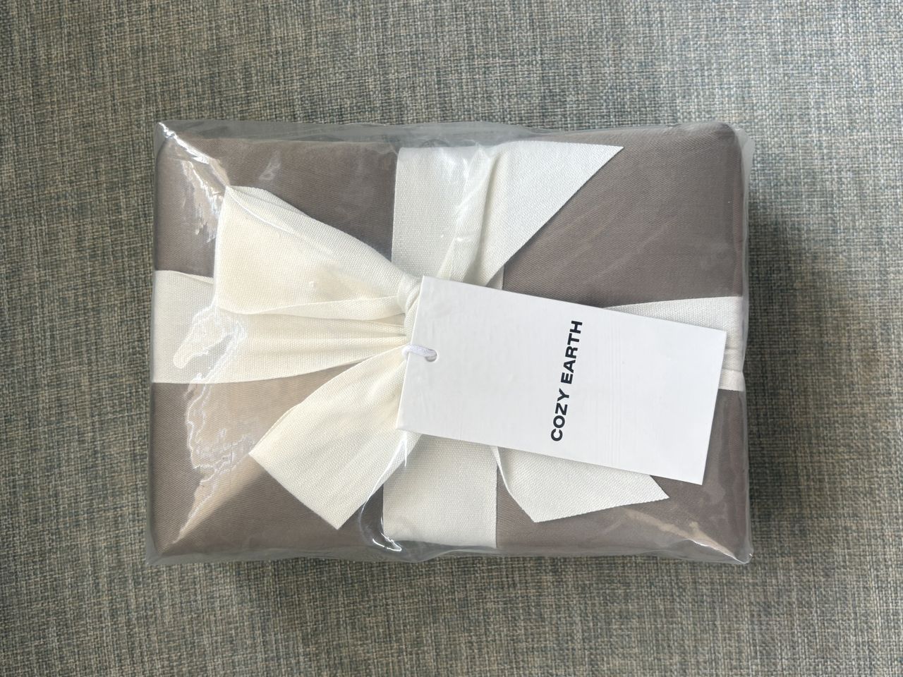 a product from cozy earth wrapped in a bow