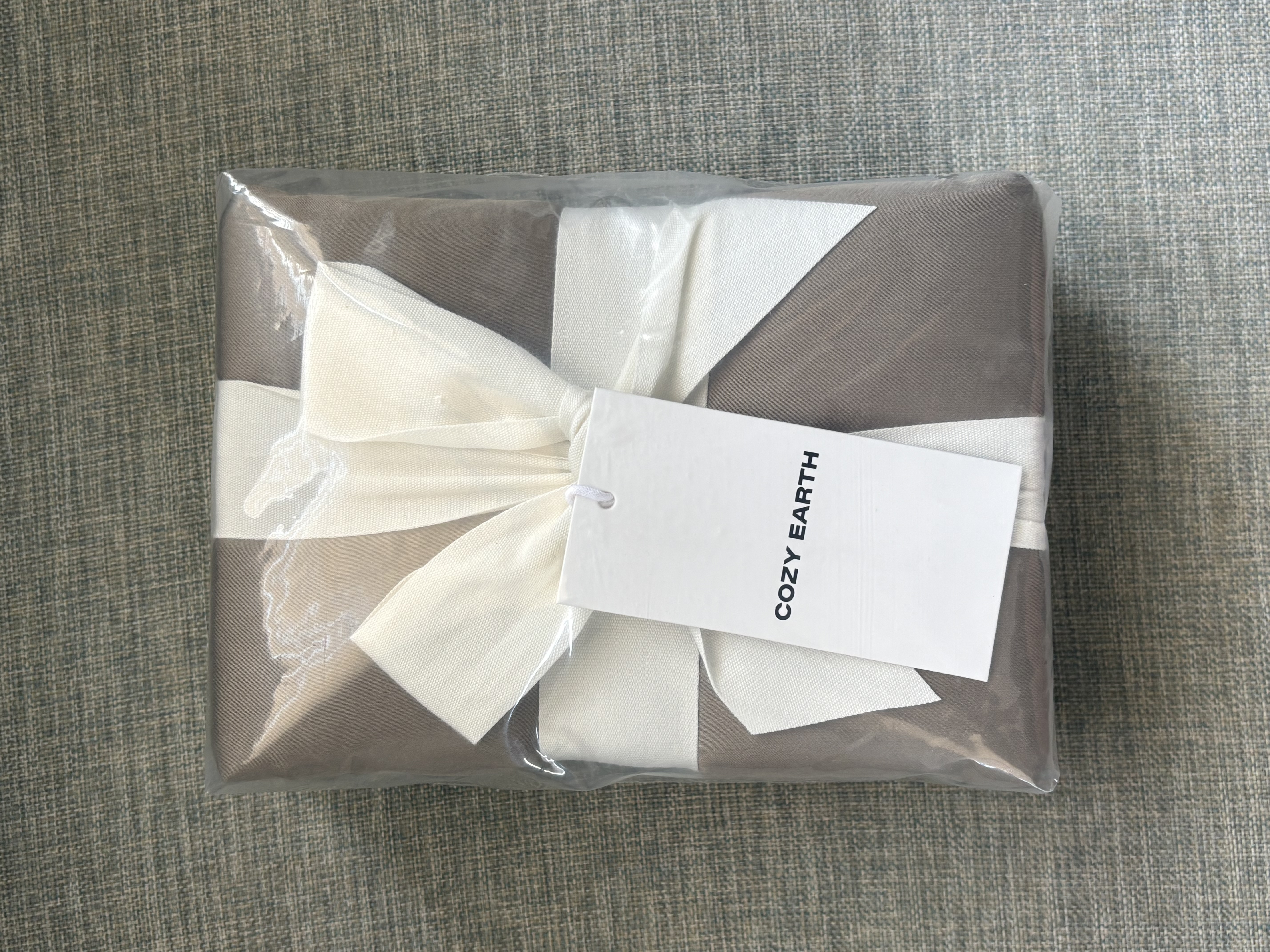 a product from cozy earth wrapped in a bow
