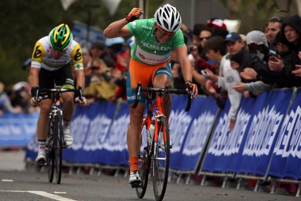 Playing to win: Nathan Haas (Genesys) crosses the finish line in second place, with Jack Bobridge (Garmin-Cervelo) in third