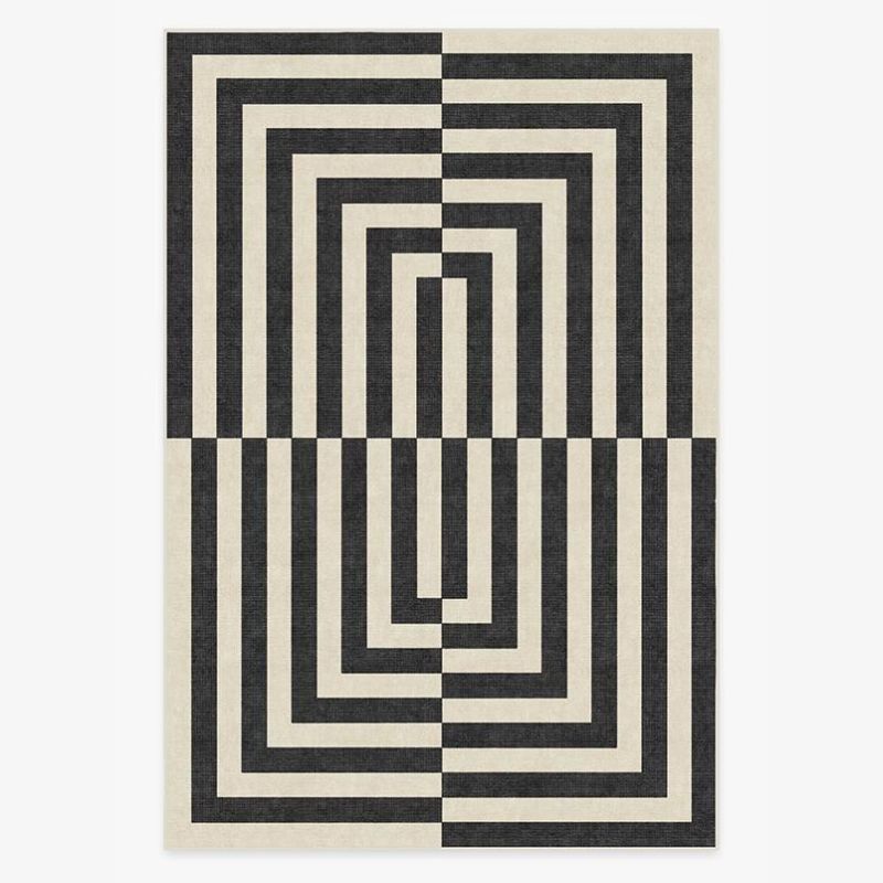 black and white geometric patterned rug