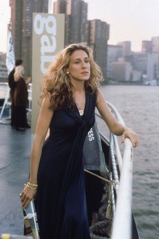 Carrie Bradshaw wearing black maxi dress