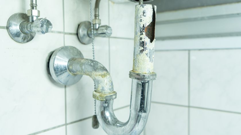 Corroded drainpipe in bathroom