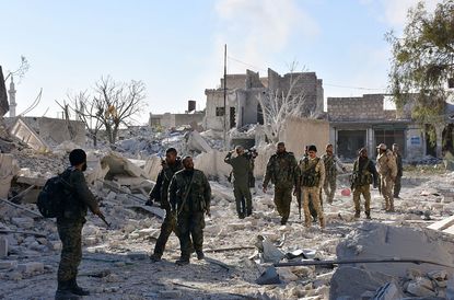 Syrian government forces and allies take key part of eastern Aleppo
