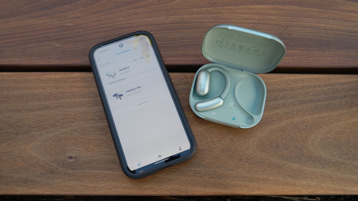Anker Soundcore AeroFit 2 next to a Google Pixel 9
