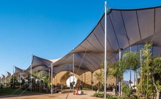 The waterproof canopy provided a communal space that ran through the temporary village