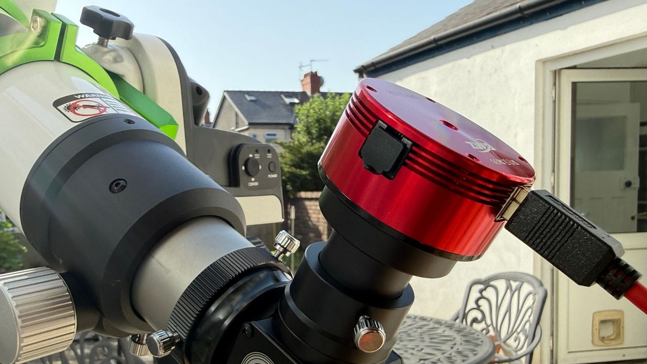 A close-up of the ZWO ASI174mm Mono camera attached to the Sky-Watcher Heliostar 76Ha solar telescope.
