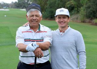 Lee and Daniel Trevino pose for a photo at the PNC Championship