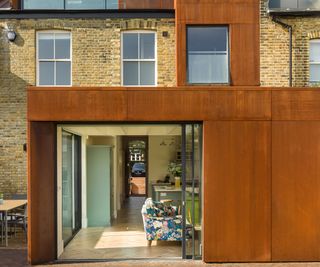 Corten clad rear kitchen extension with sliding glass doors