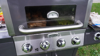 The Cuisinart Four Burner Dual Fuel Gas Grill shows the temperature on the lid