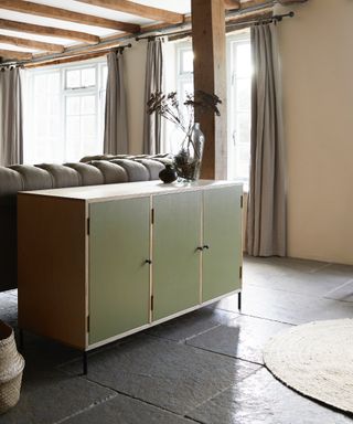 colors not to paint your furniture, farmhouse style living room with beams, stone tiles, bespoke sideboard painted pale green