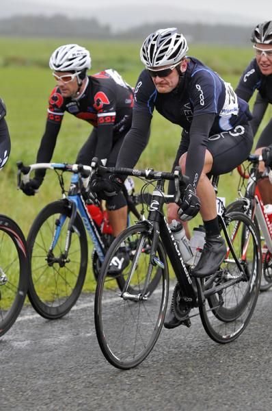 Landis of Orca Velo Marino is not impressed with the cold wet weather