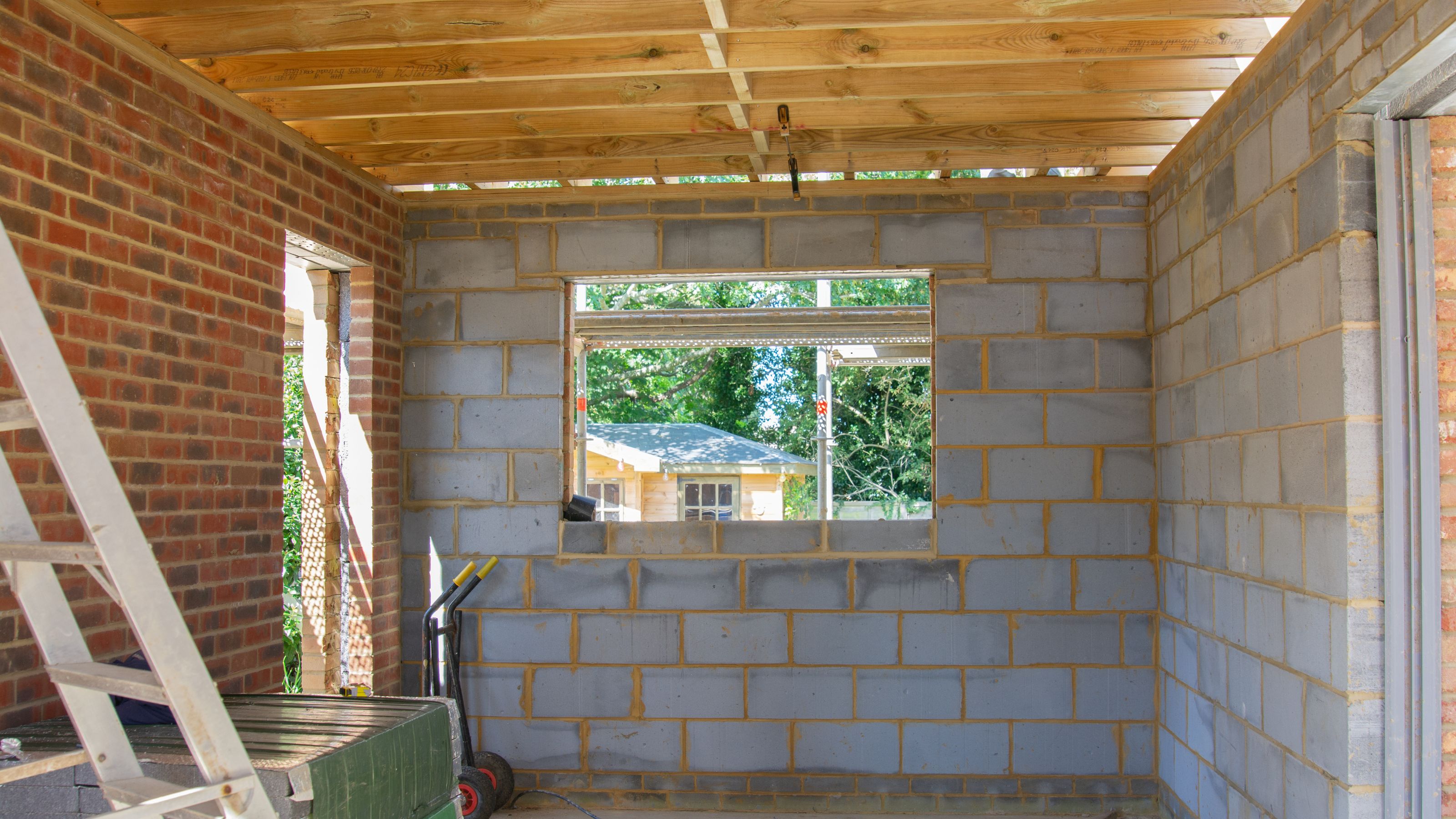 Garage stripped back to shell and new roof being built