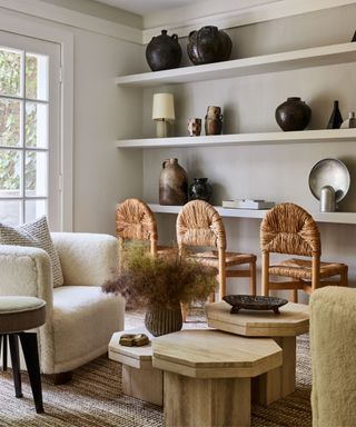 Wooden chairs, wooden tables, fluffy armchairs, black pots
