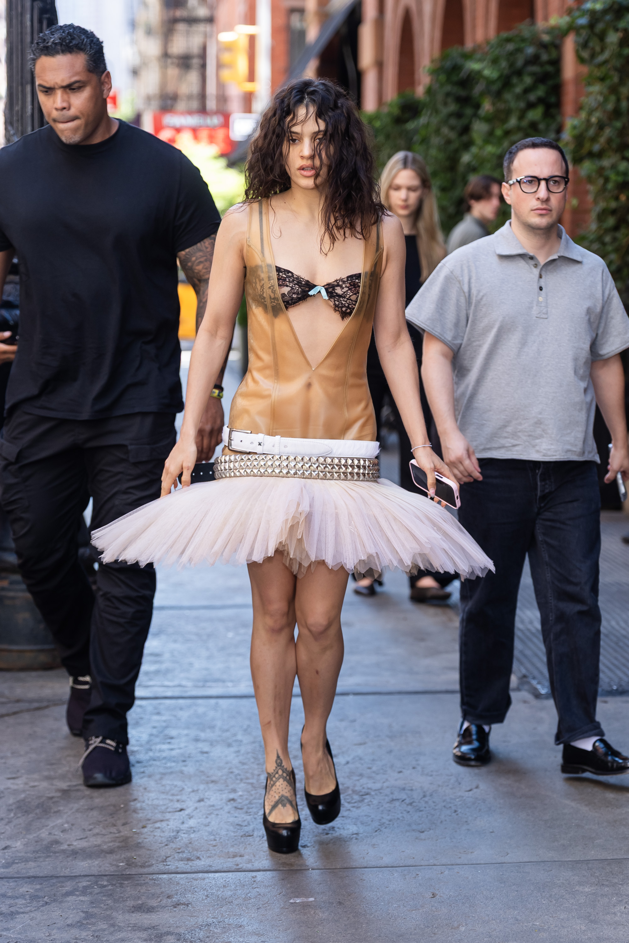 Rosalia was spotted in New York City wearing a peekaboo bra, a naked drop-waist dress, and a ballet tutu