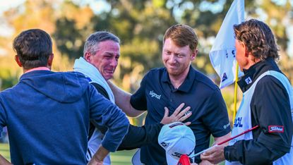 Hayden Springer celebrates gaining his PGA Tour card alongside his emotional caddie
