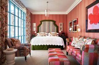 A vibrantly decorated hotel bringing British eccentrism to New York features a mixture of colorful textures, finishes, and textiles for a striking result.