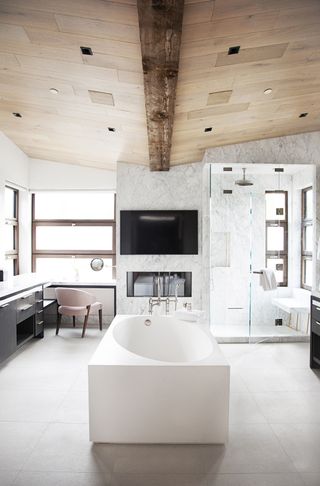 A bathroom with a sculptural bathtub