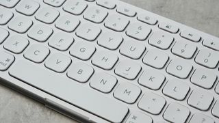 a photograph of the logitech keys-to-go 2 ipad keyboard with scissor-switch keys and 3 bluetooth channels