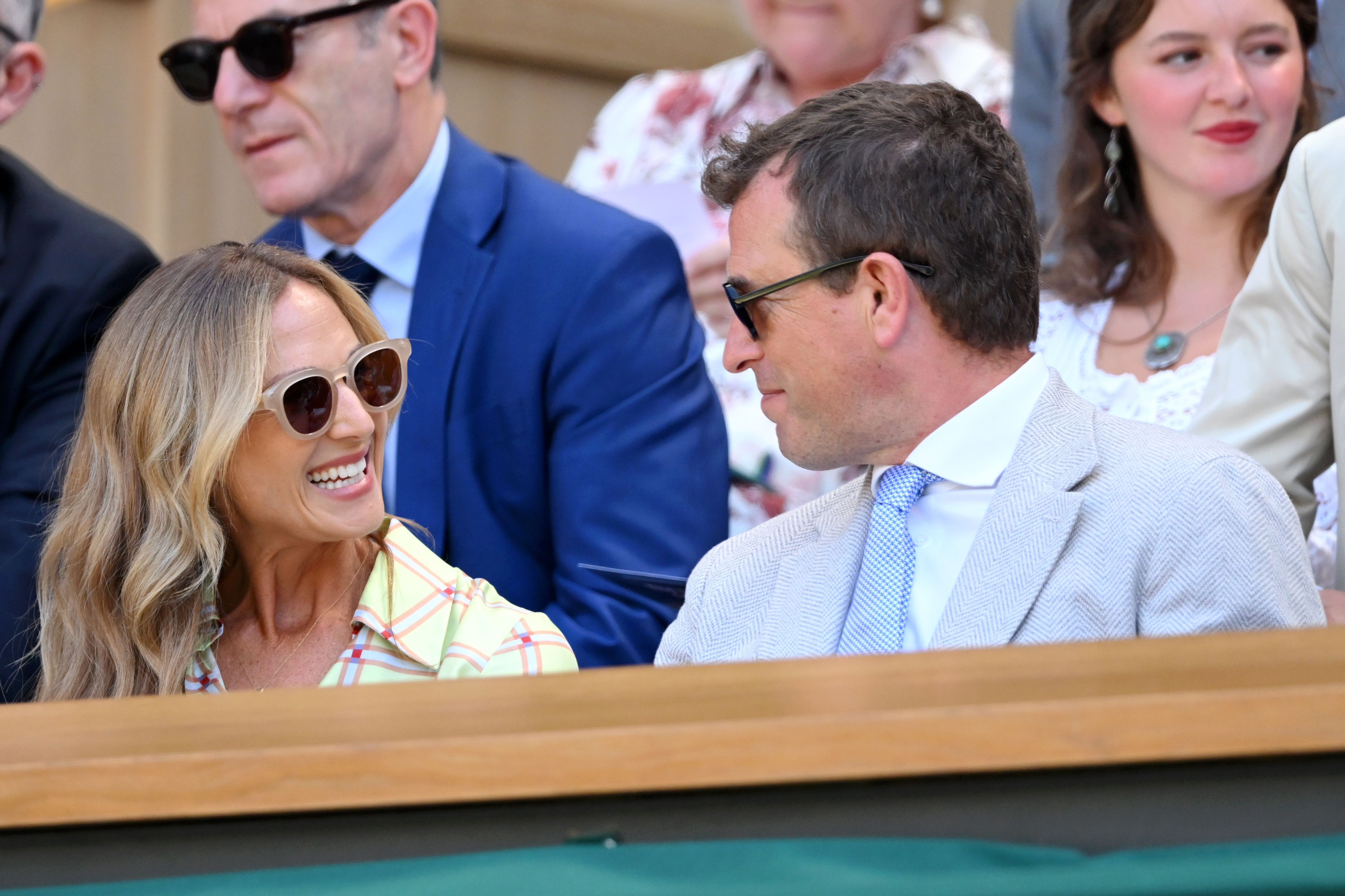 Harriet Sperling smiling at Peter Phillips