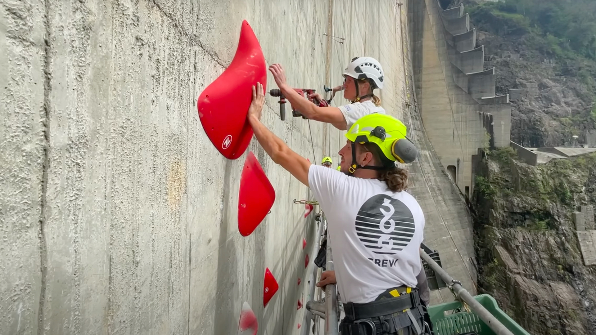 Watch workers building the Red Bull Dual Ascent climbing route on a ...