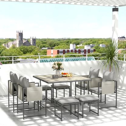 outdoor patio with dining table and chairs