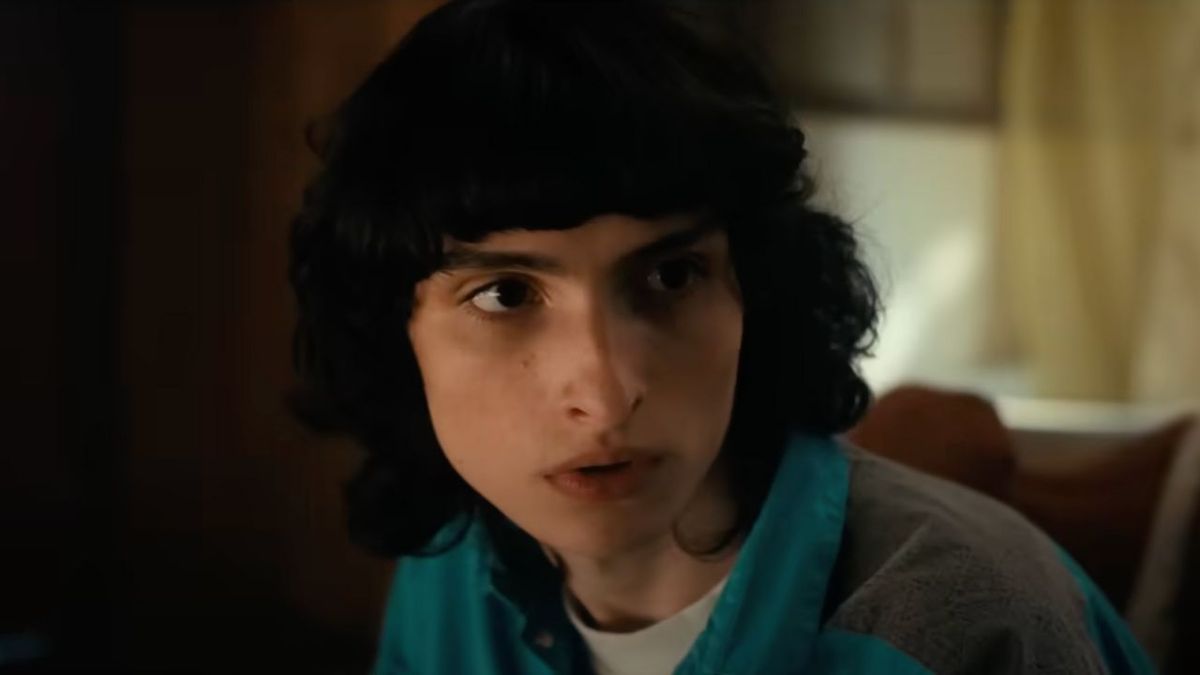 Finn Wolfhard as Mike Wheeler starring to the left of the camera in Stranger Things Season 4