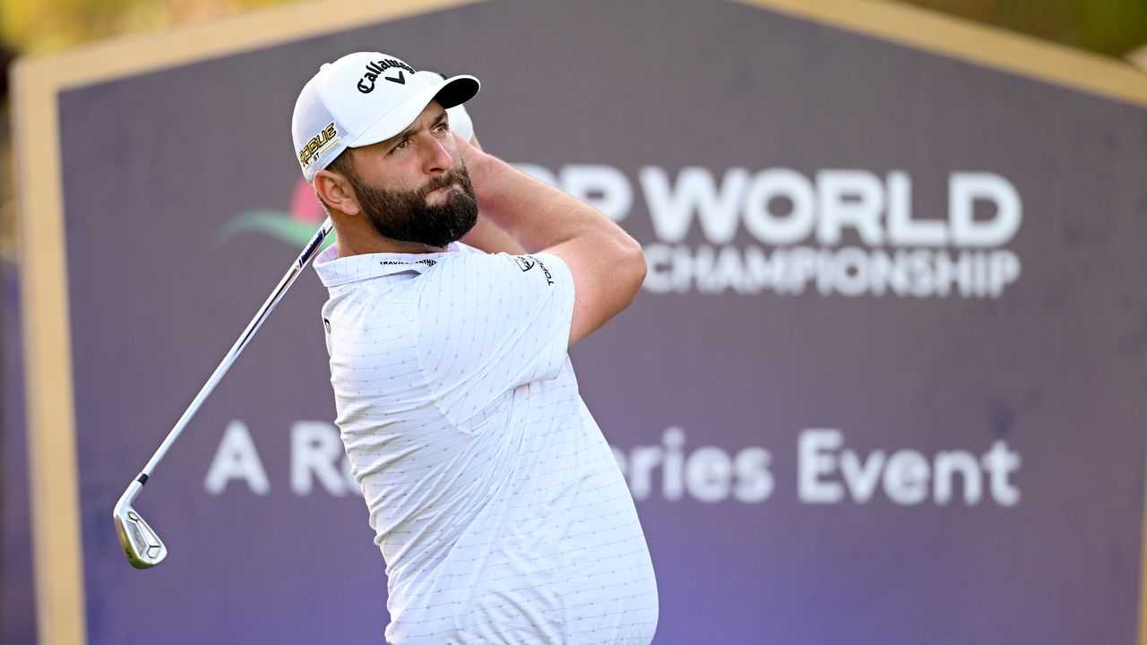 Jon Rahm hitting a shot on a practice day at the 2022 DP World Tour Championship