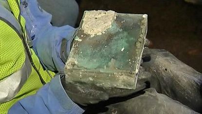 Time capsule buried by Paul Revere and Samuel Adams unearthed in Boston