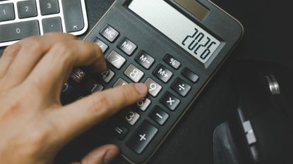 Calculator that reads "2026"