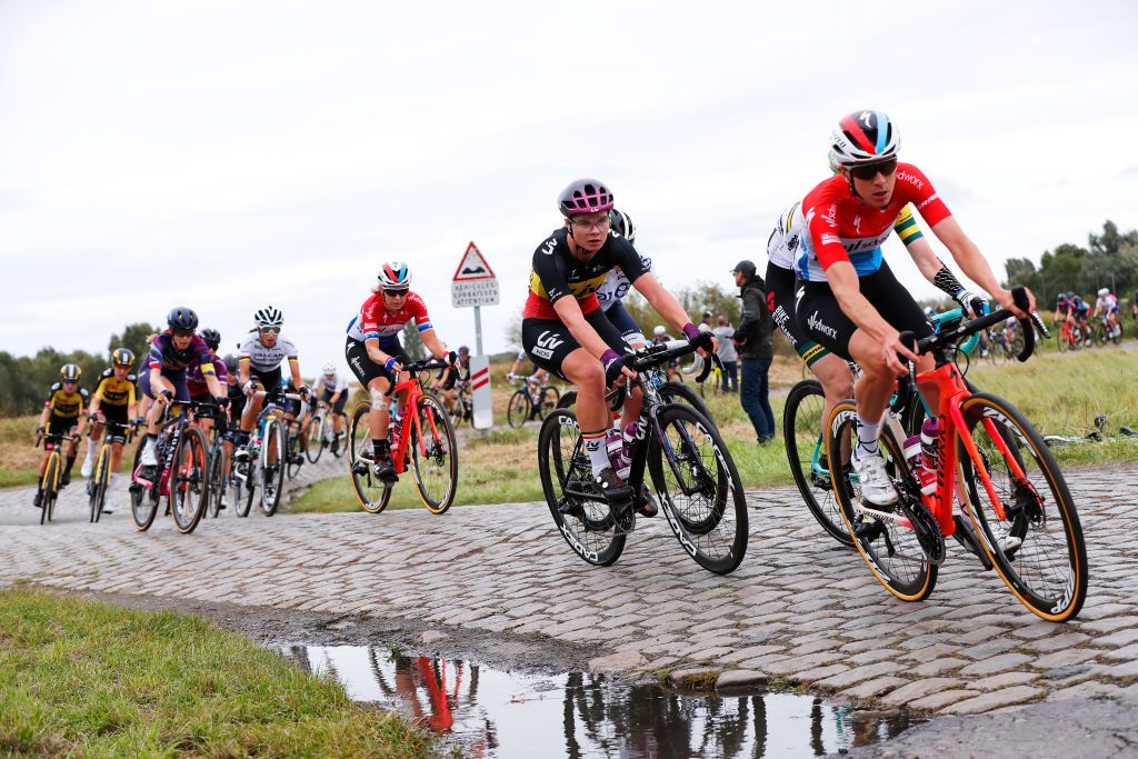 ROUBAIX FRANCE OCTOBER 02 LR Lotte Kopecky of Belgium and Team Liv Racing and Christine Majerus of Luxembourg and Team SD Worx compete through Hornaing Wandignies cobblestones sector during the 1st ParisRoubaix 2021 Womens Elite a 1164km race from Denain to Roubaix ParisRoubaixFemmes ParisRoubaix on October 02 2021 in Roubaix France Photo by Bas CzerwinskiGetty Images