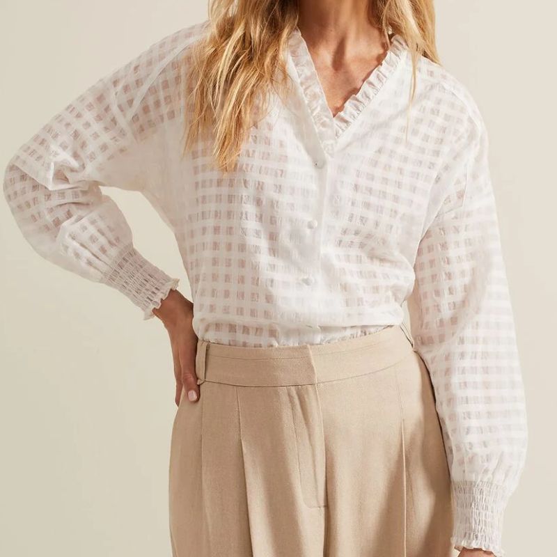 white textured blouse