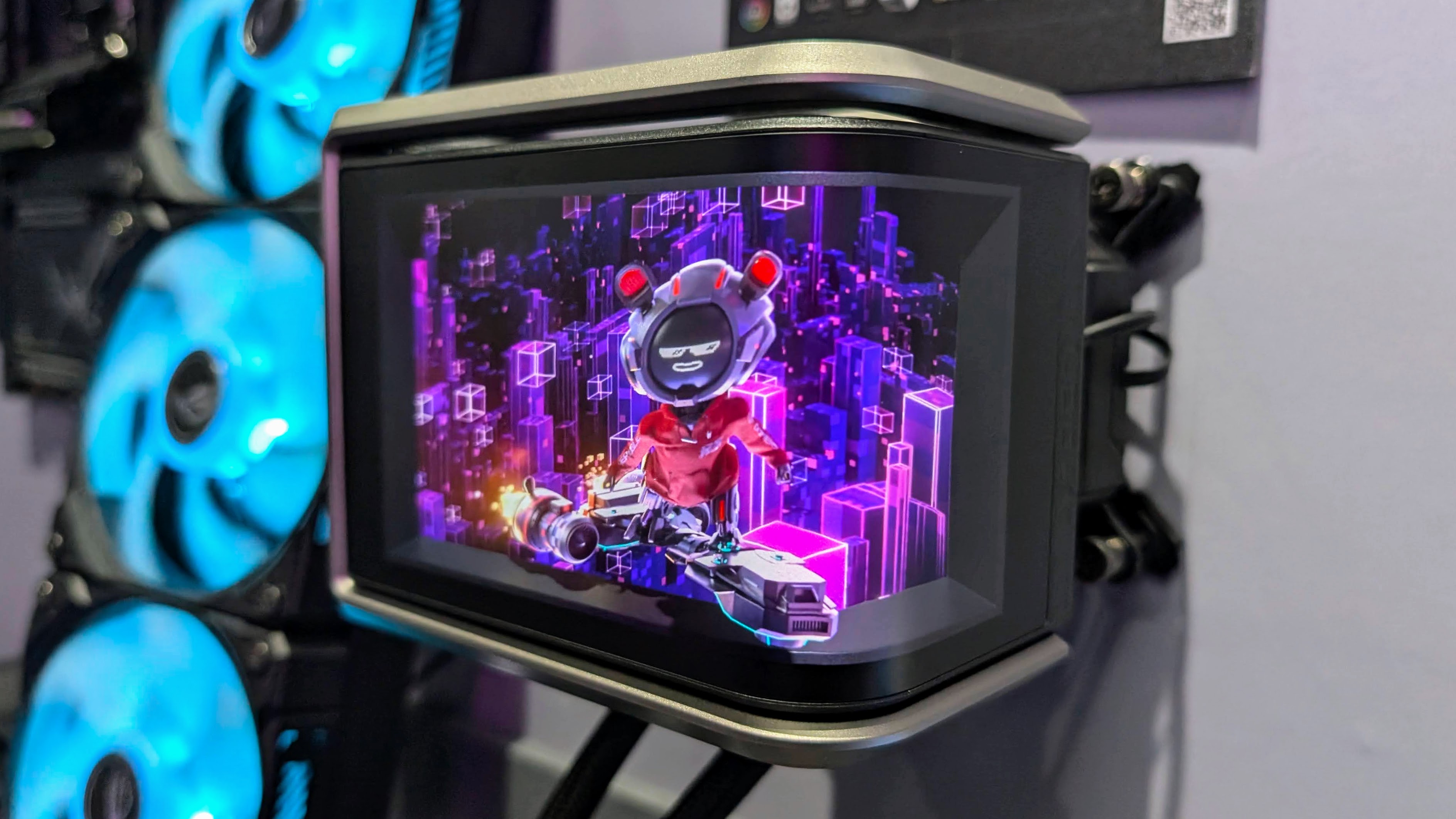 The ROG Ryuo IV SLC 360 ARGB cooler showing 3D effect at Computex 2025