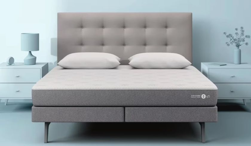 A grey Sleep Number smart beds in blue room