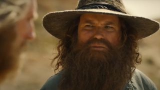 A close up of Tom Bombadil in The Rings of Power season 2