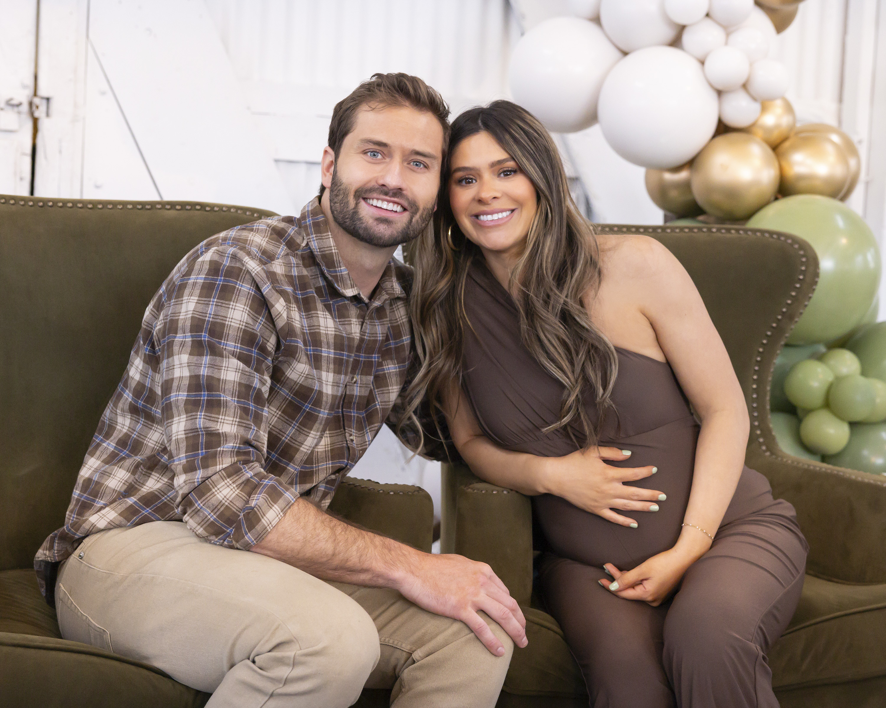 Dakota Mortensen and Taylor Frankie Paul pose together on a couch at a baby party in the secret life of Mormonian women