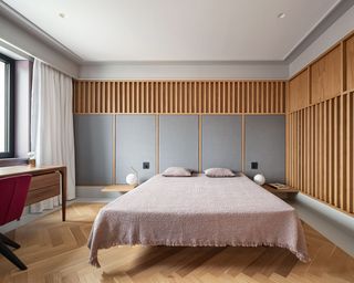 Grey fabric and timber panelling in the bedroom