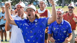 Cameron Smith and Lucas Herbert celebrate a Marc Leishman putt during the Team Championship