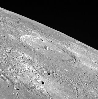 This June 3, 2011 view off the limb of Mercury provides a unique oblique view of the crater Verdi. Topographic variation can be seen along Mercury's limb.