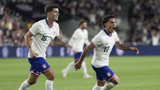 Alejandro Zendejas and Christian Pulisic celebrating in action for the USMNT
