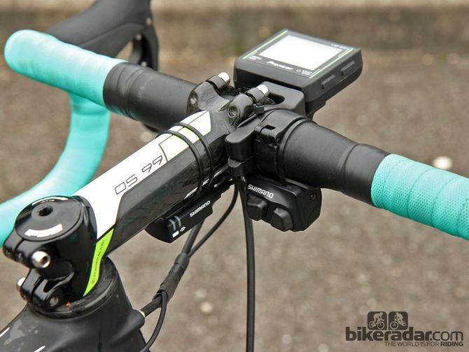 The cockpits of Shimano Dura-Ace Di2-equipped team bikes are becoming an increasingly busy place these days