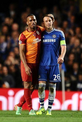 Galatasaray’s Didier Drogba (left) and Chelsea’s John Terry after playing against each other in the Champions League