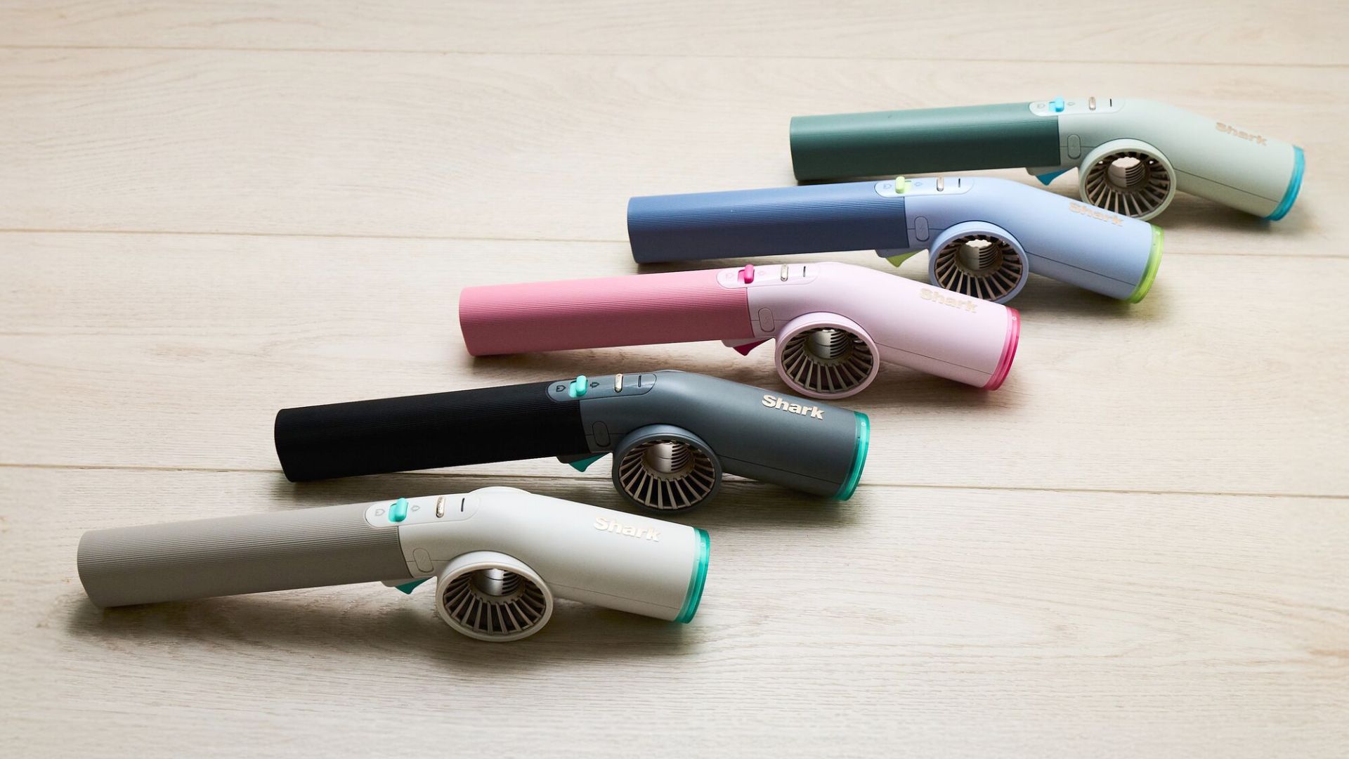 The Shark BlastBoss All In One Cleaner lined up in different colourways