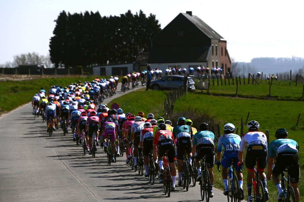 HARELBEKE BELGIUM MARCH 25 A general view of the peloton competing during the 65th E3 Saxo Bank Classic 2022 a 2039km one day race from Harelbeke to Harelbeke E3SaxobankClassic WorldTour on March 25 2022 in Harelbeke Belgium Photo by Tim de WaeleGetty Images