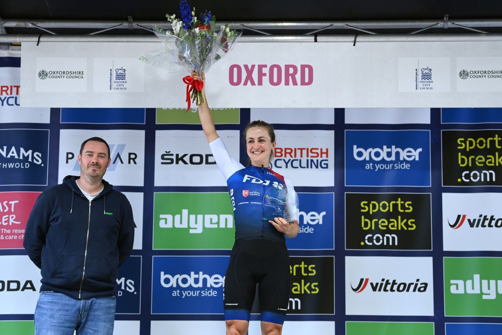 OXFORD ENGLAND JUNE 11 Grace Brown of Australia and Team FDJ Nouvelle Aquitaine Futuroscope celebrates at podium as most combative rider prize winner during the 8th The Womens Tour 2022 Stage 6 a 1429km stage from Chipping Norton to Oxford WomensTour UCIWWT on June 11 2022 in Oxford England Photo by Justin SetterfieldGetty Images
