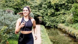 woman running listening to music