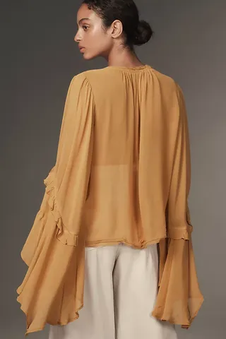 By Anthropologie Blusa con cuello en V y mangas acampanadas