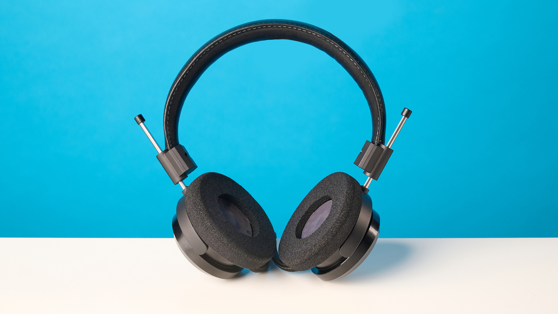 Grado SR325 photographed in front of a blue background